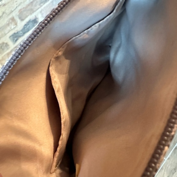 Coach snake print swing back crossbody purse. - Picture 4 of 4